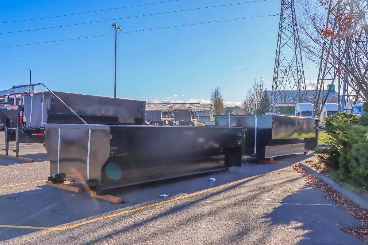 Roll-off dumpster ready for waste disposal at job site for 12 Yard Dumpster Rental in Van Alstyne